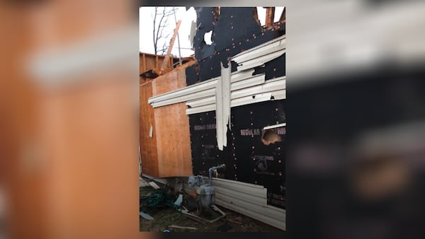 The tornado destroyed a large portion of the home's roof.