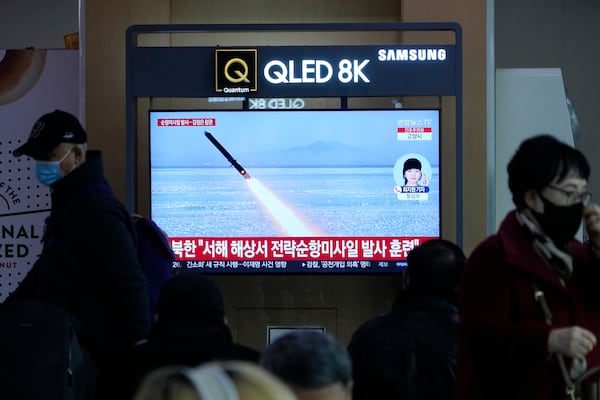 A TV screen shows an image of North Korea's missile launch during a news program at Seoul Railway Station in Seoul, South Korea, Friday, Feb. 28, 2025. (AP Photo/Ahn Young-joon)