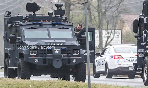 Gwinnett County authorities blocked off a portion of Ga. 124 at Webb Gin House Road early Thursday morning.