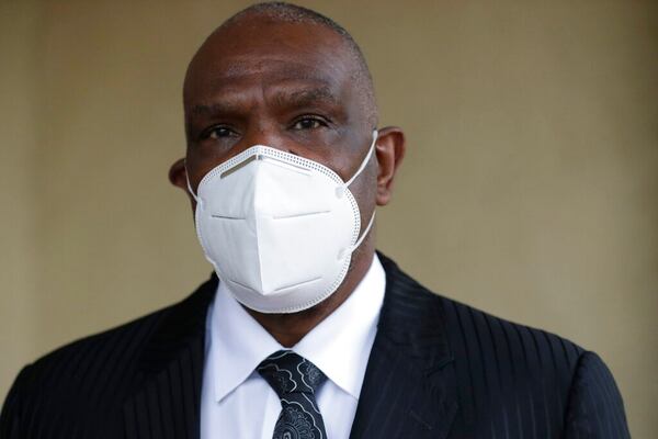 Baseball Hall of Famer Andre Dawson poses for a photo at his funeral business, Paradise Memorial Funeral Home, Thursday, April 30, 2020, in Miami.  (AP Photo/Wilfredo Lee)