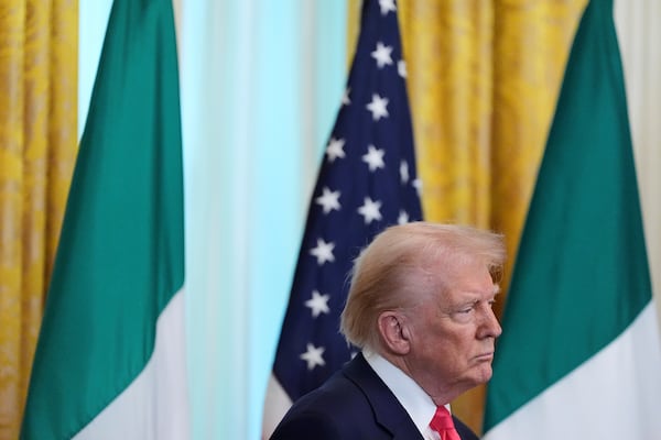 President Donald Trump listens as Ireland's Prime Minister Micheál Martin speaks during an event in the East Room of the White House in Washington, Wednesday, March 12, 2025. (AP Photo/Alex Brandon)