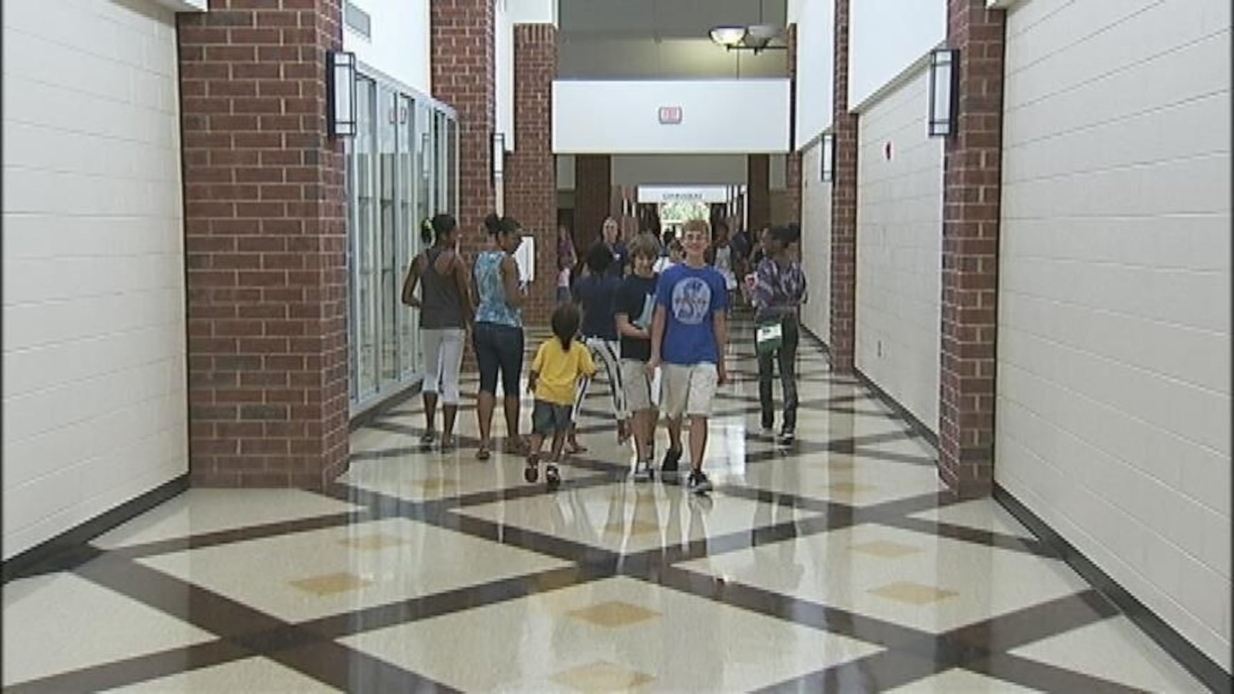 Students arrive for the first day of school.