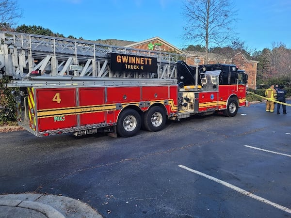 Gwinnett County firefighters responded to the scene and found the two victims on the ground after witnesses pulled them out of the car.