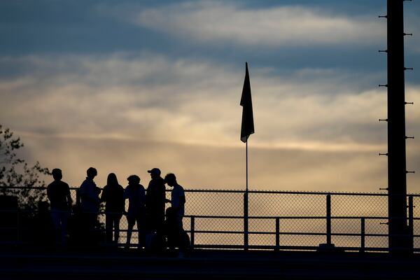 Fans are seen in the second half of a football game between the Cherokee Warrior and the Mays Raiders at a Corky Kell Classic football game Wednesday, Aug. 18, 2021 at West Forsyth High School. (Daniel Varnado/ For the AJC)