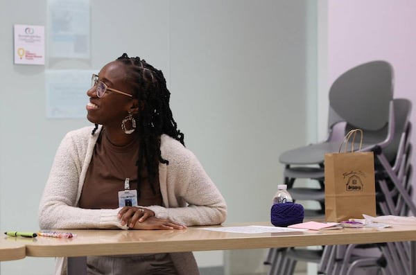 Judah David Creations owner and founder Darice Oppong listens as participants share how they feel that day during NICU support group on Wednesday, Dec. 19, 2024, at the Beverly Knight Children’s Hospital in Macon, Georgia. (Photo Courtesy of Katie Tucker/The Telegraph)