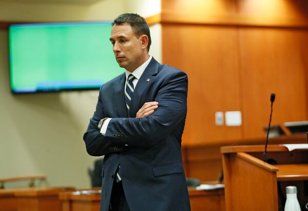 October 2, 2019 - Decatur - Prosecutor Pete Johnson waits for the next prosecution witness, DeKalb police officer Lyn Anderson, who arrived at the scene shortly after the shooting, to take the stand.   The murder trial of former DeKalb County Police Officer Robert "Chip" Olsen continued today.  Olsen is charged with murdering war veteran Anthony Hill.  Bob Andres / robert.andres@ajc.com