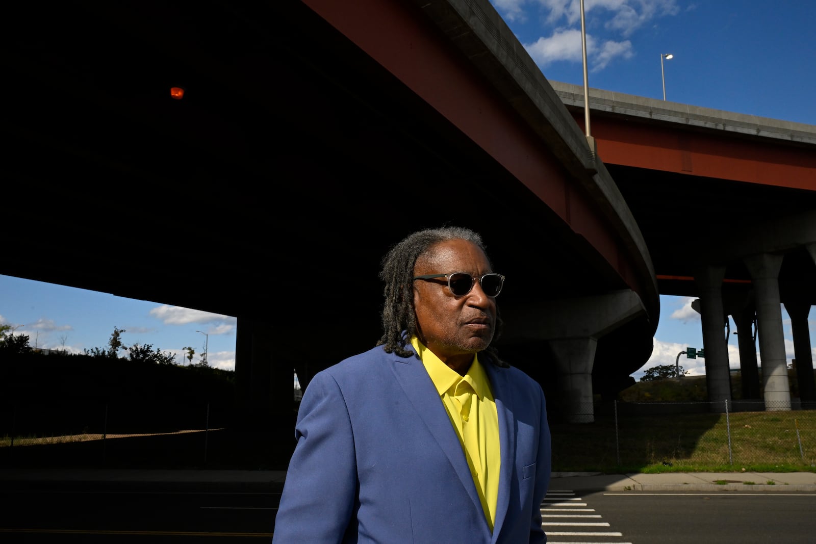 City Alder Thomas Ficklin Jr., who died suddenly at his home on Oct. 9 at the age of 75, poses Wednesday, Oct. 9, 2024, where a site was proposed for the nation's first African American college back in 1831, in New Haven, Conn. (AP Photo/Jessica Hill)