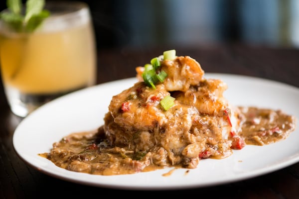 Shrimp and Crab Gravy, white shrimp cooked in crab gravy ova steamed white rice. Photo credit- Mia Yakel.