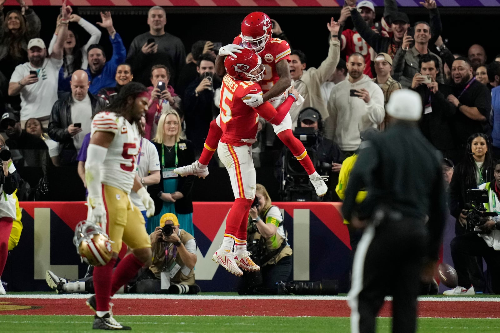 FILE - Kansas City Chiefs quarterback Patrick Mahomes celebrates with wide receiver Mecole Hardman Jr. after Hardman scored the game-winning touchdown against the San Francisco 49ers in overtime during the NFL Super Bowl 58 football game, Feb. 11, 2024, in Las Vegas. (AP Photo/John Locher, File)