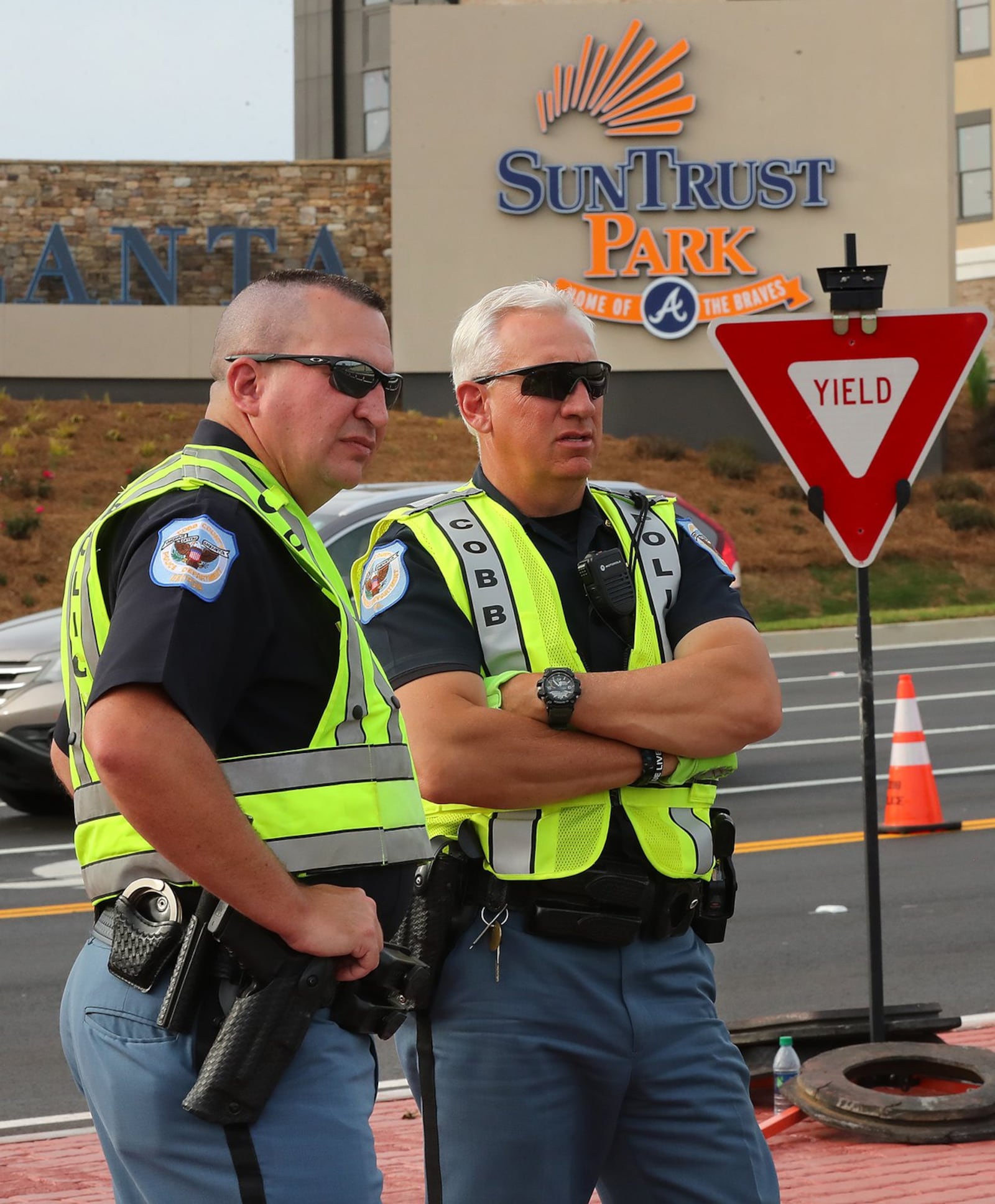 Cobb County police officers outside the SunTrust Park development on May 3, 2017. Curtis Compton/ccompton@ajc.com