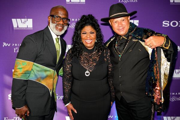 Bebe Winans, Kim Burrell and Narada Michael Walden pose for a photo at the 2nd annual Whitney Houston Legacy of Love Gala. Wednesday, Aug. 9, 2023. (Ben Hendren for the Atlanta Journal-Constitution)