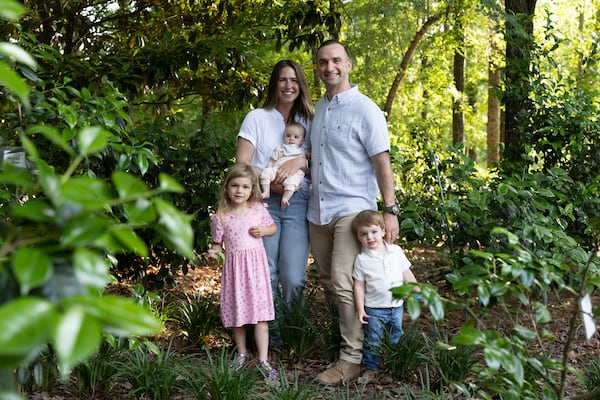 U.S. Army Maj. Jack Gibson of the 75th Ranger Regiment with his wife, Meredith, and children, left to right, Georgia, 4, Davis, 4 months, and Nash, 2, in Columbus on Thursday, May 2, 2024. (Arvin Temkar / AJC)