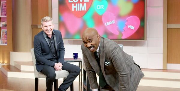 Todd Chrisley and Steve Harvey on the set of Harvey's show. Chrisley was not tolerating any smack talk about his friend.