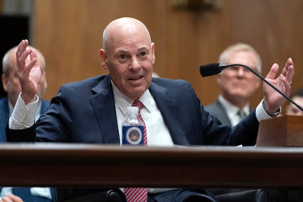 Postmaster General Louis DeJoy testifies during a hearing before the Senate Homeland Security and Governmental Affairs Committee in Washington on Thursday.