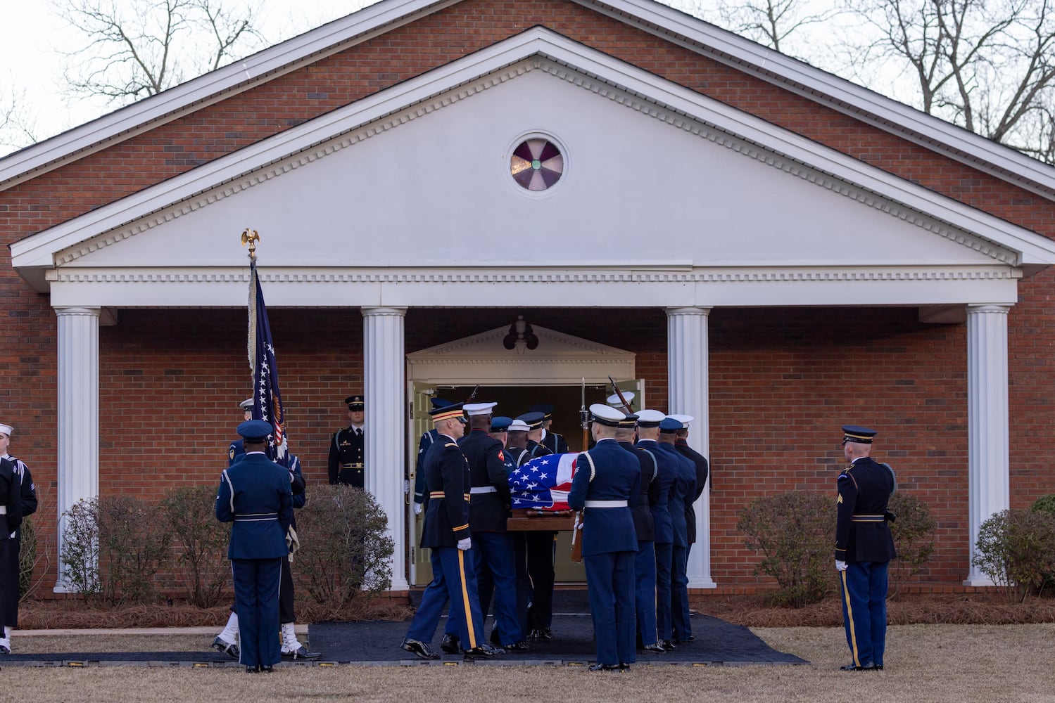 President Carter comes home to Plains for final funeral service
