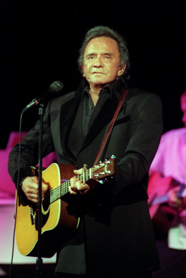 The music of Johnny Cash comes to Roswell this month. In this historic photo, the man himself performs in 1997 at the Majestic Theatre in downtown Dallas. PHOTO: MICHAEL AINSWORTH/DALLAS MORNING NEWS