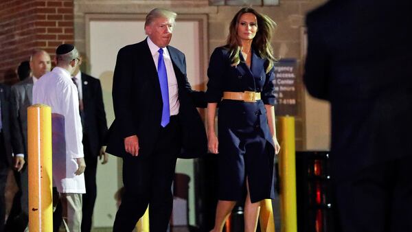 President Donald Trump and first lady Melania Trump walk to their vehicle after visiting MedStar Washington Hospital Center in Washington, Wednesday, June 14, 2017, where House Majority Leader Steve Scalise of La. was taken after being shot in Alexandria, Va., during a Congressional baseball practice. (AP Photo/Pablo Martinez Monsivais)