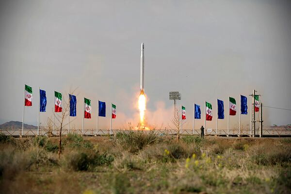 In this photo released Wednesday by Sepahnews, an Iranian rocket carrying a satellite is launched from an undisclosed site believed to be in Iran’s Semnan province. 