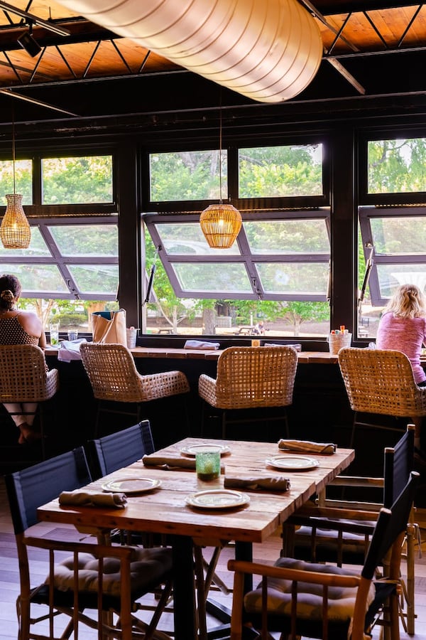 Counter seating on the third level of BOHO115 offers a view of Decatur Square. Photo by Rebecca Carmen