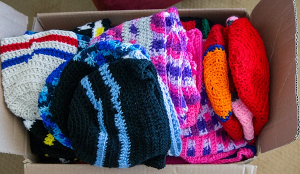 Margrit Ottwiller has crocheted hats throughout the pandemic to give to charity. She has more than 100 and donated them to Community Friendship, an organization that provides many psychiatric rehabilitative services here in Atlanta.  PHIL SKINNER FOR THE ATLANTA JOURNAL-CONSTITUTION.