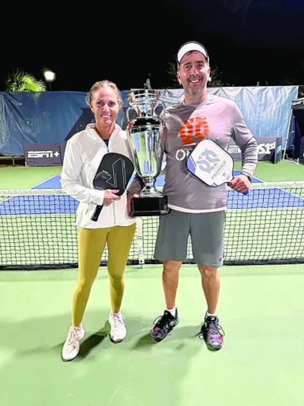 Simon with doubles partner Dan Granot with their trophy from the Hilton Head Open.