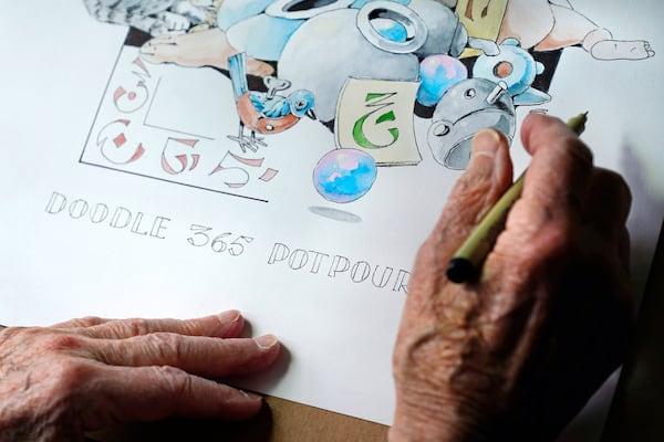 FILE - Artist Robert Seaman works on his 365th daily doodle in his room at an assisted living facility Monday, May 10, 2021, in Westmoreland, N.H. (AP Photo/Charles Krupa, File)