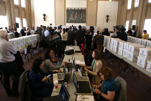 Journalists prepare for the release of more than 1.4 million pages of records in the Atlanta City Hall bribery scandal at a press conference with Mayor Kasim Reed on Thursday, Feb. 9, 2017. (HENRY TAYLOR / HENRY.TAYLOR@AJC.COM)