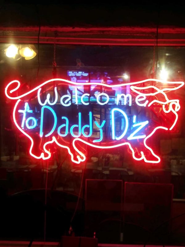 A neon sign welcomes patrons to Daddy D'z. (Courtesy of Christianah Coker-Jackson)