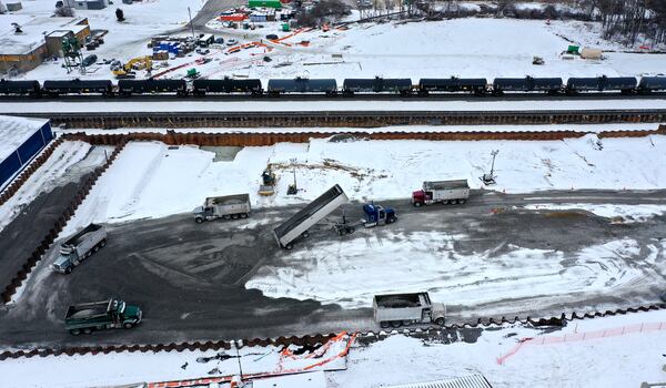 An aerial photo shows where crews are backfilling stone and gravel on the site of the Feb. 3, 2023, Norfolk Southern freight train derailment, Monday, Jan. 22, 2024, in East Palestine. (Matt Freed for the Atlanta Journal Constitution)