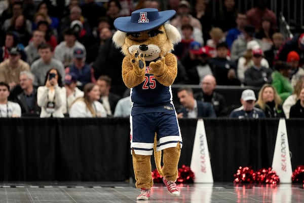 Arizona mascot Wilbur T. Wildcat performs during the second half of an NCAA college basketball game against Houston for the championship in the Big 12 Conference tournament, Saturday, March 15, 2025, in Kansas City, Mo. (AP Photo/Charlie Riedel)