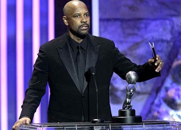 Denzel Washington accepts the award for outstanding actor in a motion picture for "The Great Debaters."