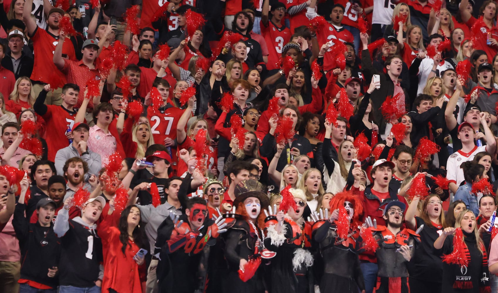 Georgia fans cheer during pregame ceremonies at the College Football Playoff Semifinal between the Georgia Bulldogs and the Ohio State Buckeyes at the Chick-fil-A Peach Bowl In Atlanta on Saturday, Dec. 31, 2022. (Jason Getz / Jason.Getz@ajc.com)