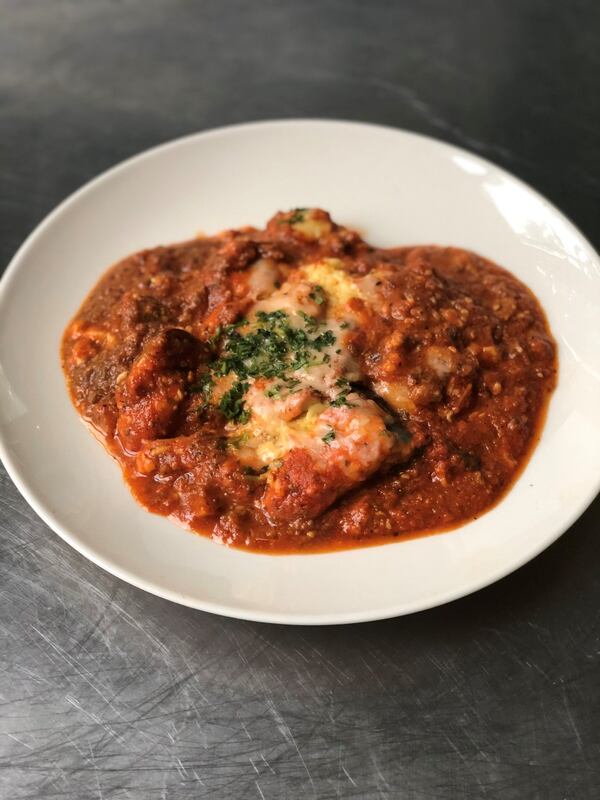 Olive Bistro’s classic Greek moussaka, as plated at home by our writer. CONTRIBUTED BY WENDELL BROCK