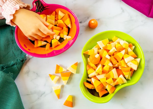 Help yourself to homemade candy corn made from powdered sugar, dry milk and a little bit of patience. (Aaliyah Man for The Atlanta Journal-Constitution)