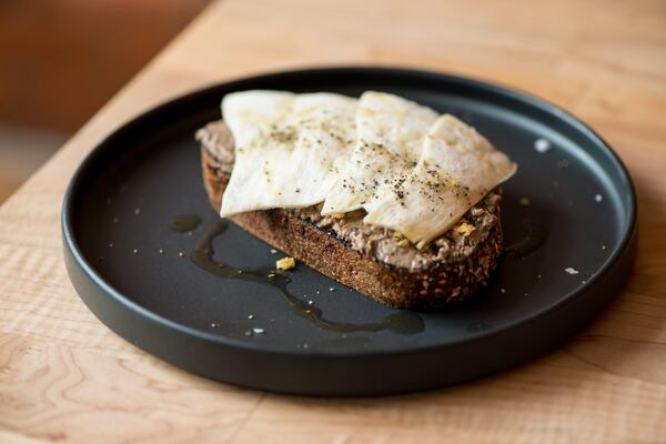  Chicken livers, toast, honey, frico, king trumpet mushrooms. Photo credit- Mia Yakel.