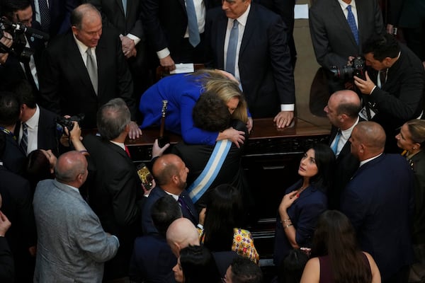 Argentina's President Javier Milei embraces his sister, Karina Milei, after delivering the annual State of the Nation address, which marks the start of the legislative year, in Buenos Aires, Argentina, Saturday, March 1, 2025. (AP Photo/Rodrigo Abd)