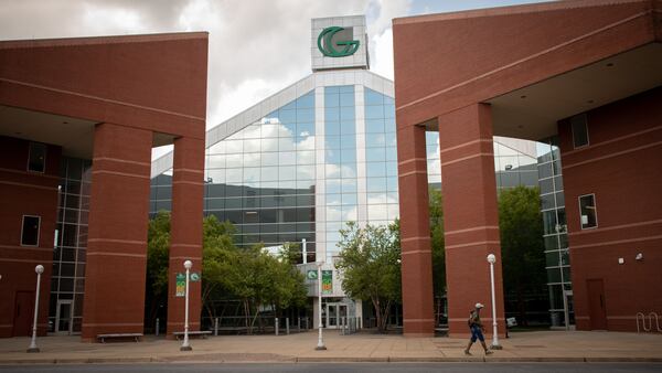 A student walking across Georgia Gwinnett College’s campus in Lawrenceville, Ga. on Thursday, June 24. Although the campus is still relatively empty, students are filtering back in for summer classes, and will return for in-person classes in the fall. 