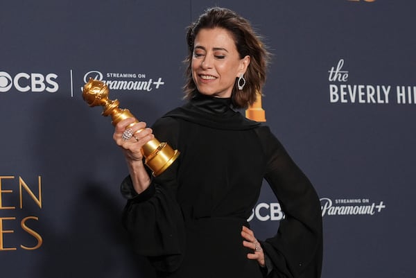 FILE - Fernanda Torres poses in the press room with her award for best performance by a female actor in a motion picture - drama for, "I'm Still Here", during the 82nd Golden Globes, in Beverly Hills, Calif., Jan. 5, 2025. (AP Photo/Chris Pizzello, File)