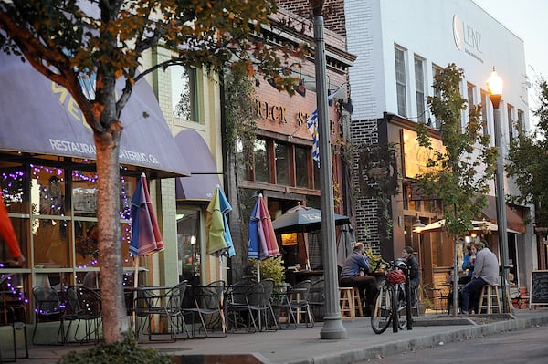 The Brick Store Pub (center) is flanked by Colbeh Persian Kitchen and Sweet Melissa’s in Decatur.