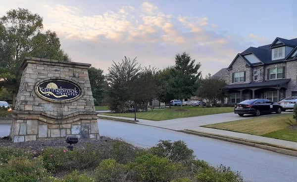 Residents of Springbrook Estates, a subdivision just off Lewis Road in southern Powder Springs, are opposed to a warehouse and logistics center proposed to be built near their community. Springbrook Estates homeowners met Tuesday with the developer planning to build the facilities. (Matt Bruce/AJC)