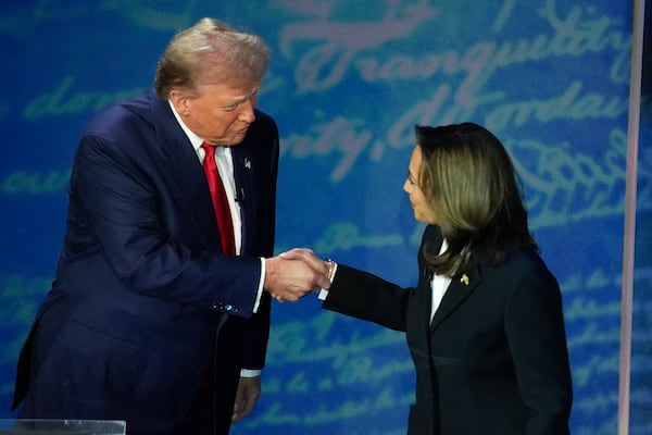 Republican presidential nominee former President Donald Trump and Democratic presidential nominee Vice President Kamala Harris shake hands before the start of an ABC News presidential debate at the National Constitution Center, Tuesday, Sept. 10, 2024, in Philadelphia. (AP Photo/Alex Brandon)