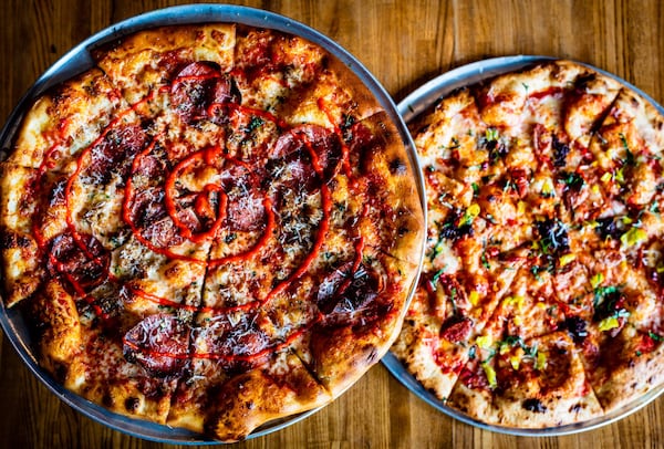 MTH Pizza’s pies include the Jimmy Two Times (left), with tomato, fennel sausage, finocchiona and mozzarella; and the Hell Boy, with tomato, garlic, ‘nduja, Calabrian chile and basil. CONTRIBUTED BY HENRI HOLLIS