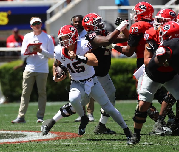 041324 Athens: Carson Beck breaks away on a quarterback keeper during the G-Day game on Saturday, April 13, 2024.  Curtis Compton for the Atlanta Journal Constitution