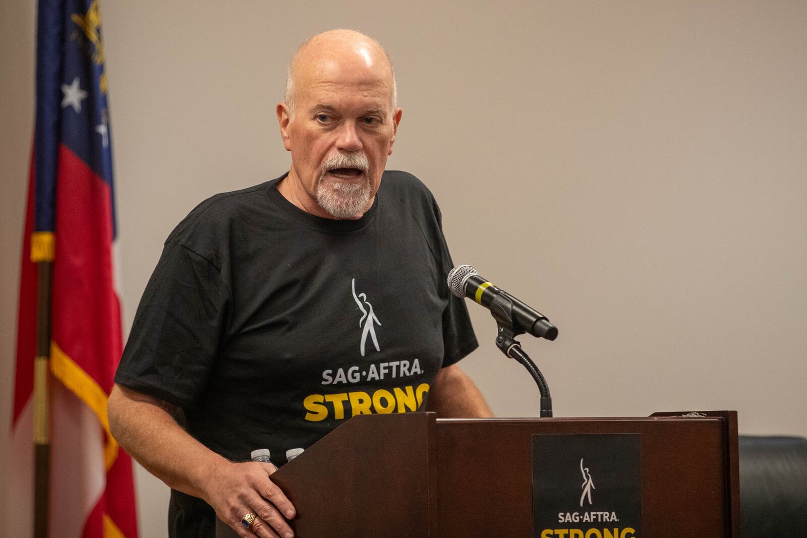 Actor Mike Pniewski speaks at the rally were union members of SAG-AFTRA and supporters gathered to discuss the strike and how important it is in Atlanta on Monday, July 17, 2023. (Katelyn Myrick/katelyn.myrick@ajc.com)