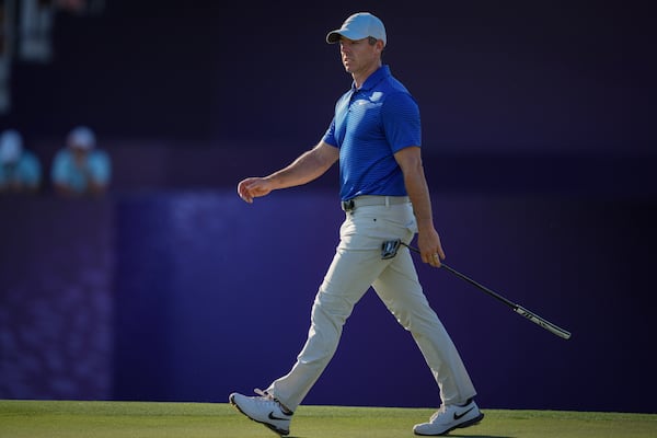 Rory McIlroy of Northern Ireland walks towards 17th green in the final round of World Tour Golf Championship in Dubai, United Arab Emirates, Sunday, Nov. 17, 2024. (AP Photo/Altaf Qadri)