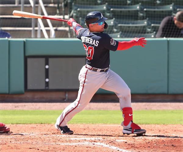 Atlanta Braves catcher William Contreras hits a two-run single to take give Atlanta a 4-1 lead over the Boston Red Sox in the third inning Monday, March 1, 2021, at JetBlue Park in Fort Myers, Fla. (Curtis Compton / Curtis.Compton@ajc.com)