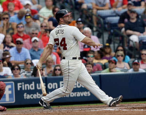 Atlanta Braves Evan Gattis bats against the Cincinnati Reds in a baseball game Sunday, July 14, 2013 in Atlanta. (AP Photo/John Bazemore) The Braves will have to to make do for a while without Evan Gattis, who led the team in June in average, OBP, slugging percentage, homers and RBIs.