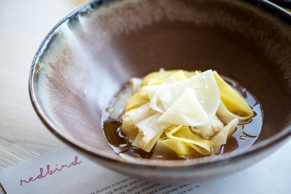 Redbird poached leeks with tomato broth and expensive olive oil. Photo credit- Mia Yakel.