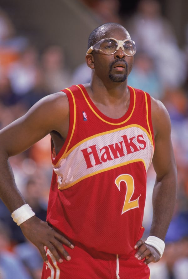 INGLEWOOD, CA - 1988: Moses Malone #2 of the Atlanta Hawks stands on the court during a NBA game against the Los Angeles Lakers at the Great Western Forum in Inglewood, California in 1988. (Photo by Mike Powell/Getty Images)