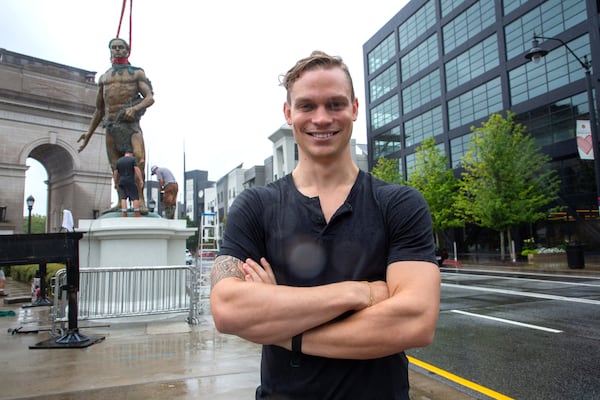 Matt Thomas, who modeled for the Tomochichi statue, stands in front of it as it’s being installed at Millennium Gate Museum on 17th St. Monday, September 20, 2021.  STEVE SCHAEFER FOR THE ATLANTA JOURNAL-CONSTITUTION